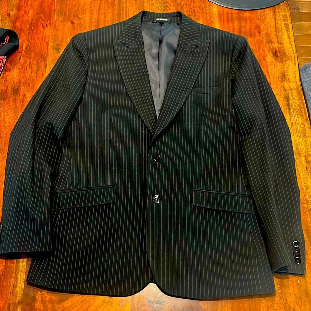 Gorgeous blazer, never worn. Subtle grey/white pinstripes. Slim fit.